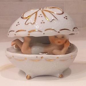 Vtg Ceramic Peekaboo Pixie Child in Egg White with Gold Trim Signed with Blue P
